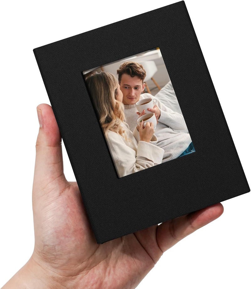 Remowith Small 4x6 Photo Album 100 Pockets Linen Cover with Front Window Portable Mini Picture Book for Family Travel Wedding and Memory Keepsake Organizer Black - Image 1